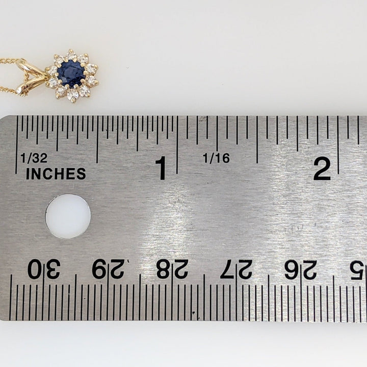 14K SAPPHIRE ROUND 4.3MM WITH .27DTW (9) ESTATE PENDANT & CHAIN 2.5 GRAMS