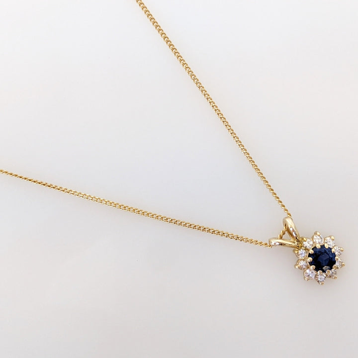 14K SAPPHIRE ROUND 4.3MM WITH .27DTW (9) ESTATE PENDANT & CHAIN 2.5 GRAMS