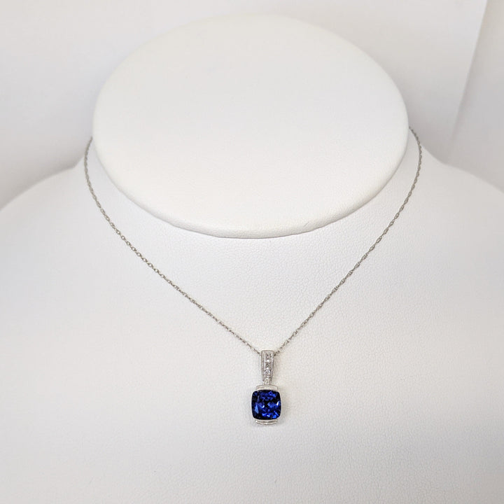 10K WHITE LAB CREATED SAPPHIRE CUSHION CUT 7X7 WITH (6) MELEE ESTATE PENDANT & CHAIN 2.1 GRAMS