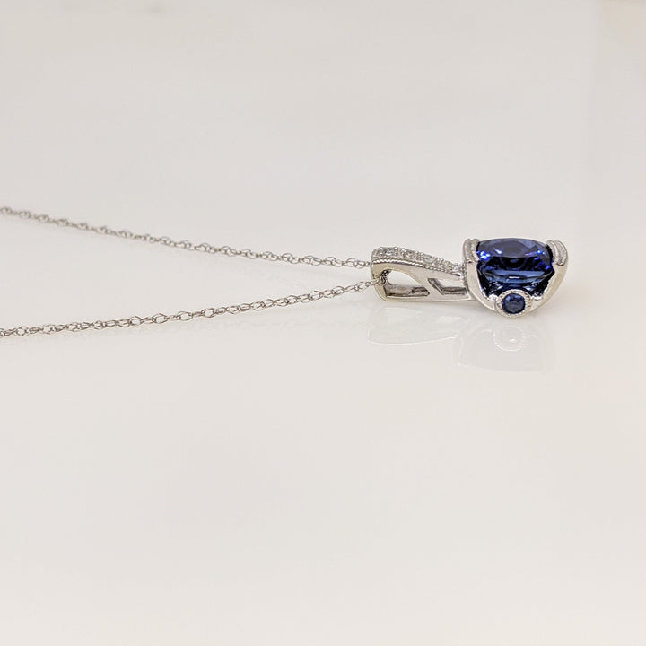 10K WHITE LAB CREATED SAPPHIRE CUSHION CUT 7X7 WITH (6) MELEE ESTATE PENDANT & CHAIN 2.1 GRAMS