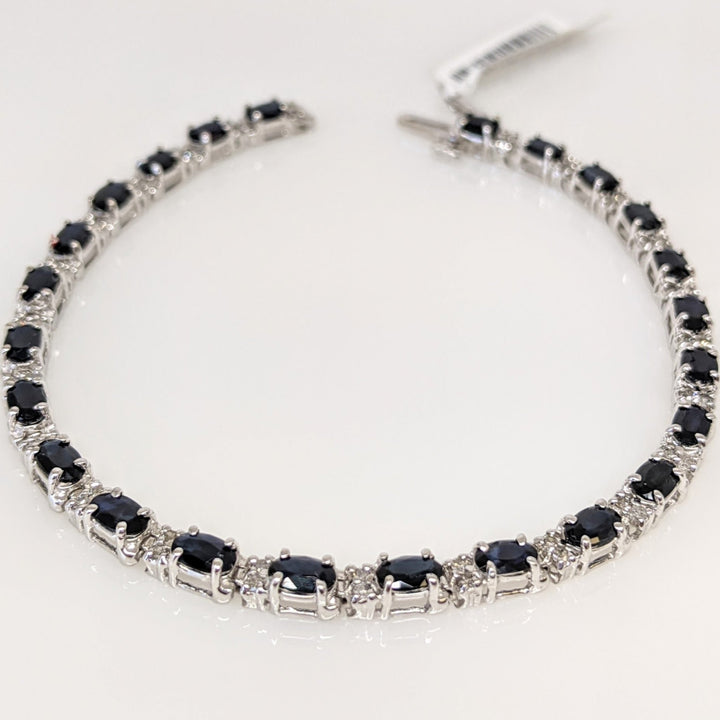 14K WHITE SAPPHIRE "C" OVAL Z924) 3X5 WITH (48) MELEE .48DTW ESTATE BRACELET 8.0 GRAMS