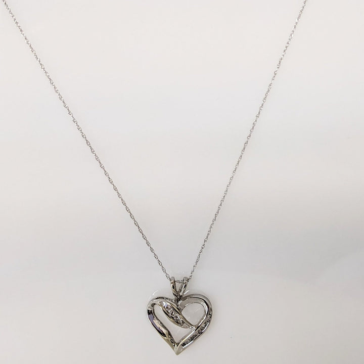 10K WHITE .22CTW I1 I DIAMOND ROUND (4) BAGUETTE (12) ESTATE HEART PENDANT & CHAIN 2.5 GRAMS