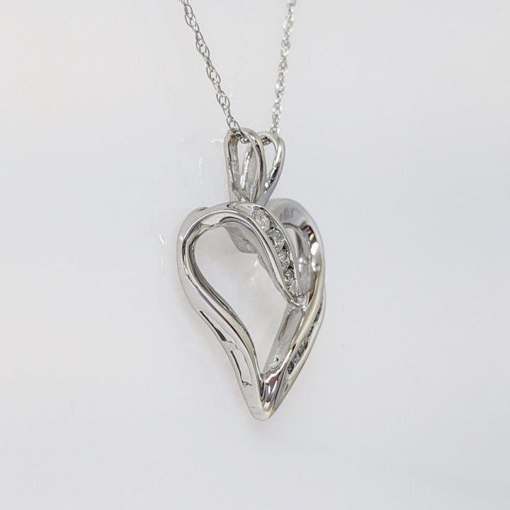 10K WHITE .22CTW I1 I DIAMOND ROUND (4) BAGUETTE (12) ESTATE HEART PENDANT & CHAIN 2.5 GRAMS