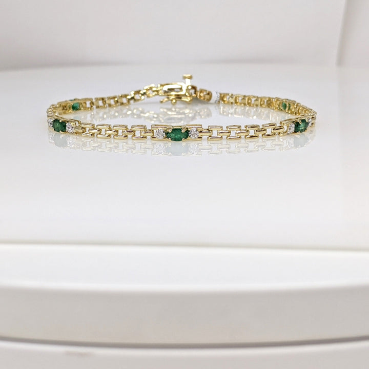 10K EMERALD OVAL (5) 3X5 WITH (2) DIAMOND ESTATE BRACELET 5.6 GRAMS