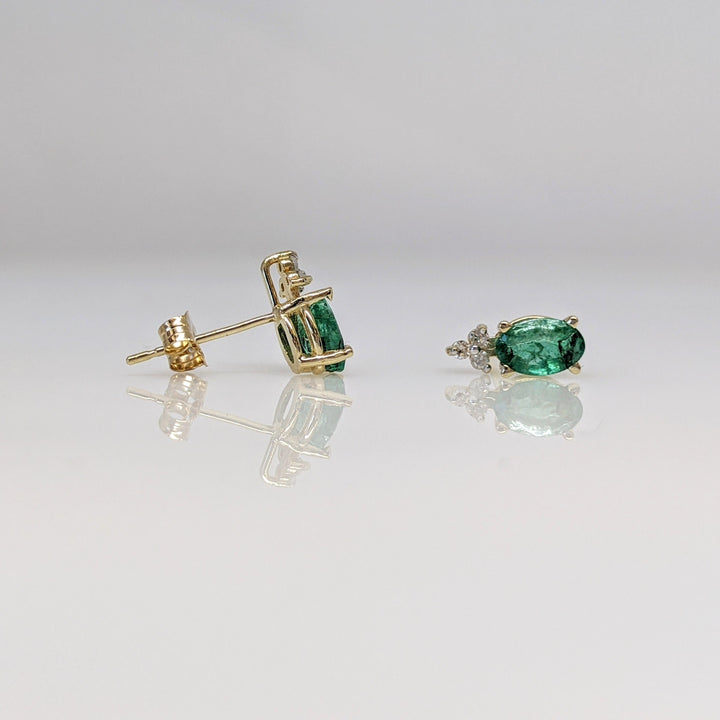 14K EMERALD "C" OVAL 4X6 WITH (6) MELEE ESTATE EARRINGS 1.0 GRAMS