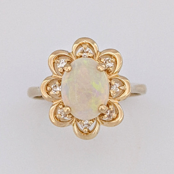 14K OPAL OVAL 7X9 WITH (8) MELEE ESTATE FLOWER RING 3.9 GRAMS