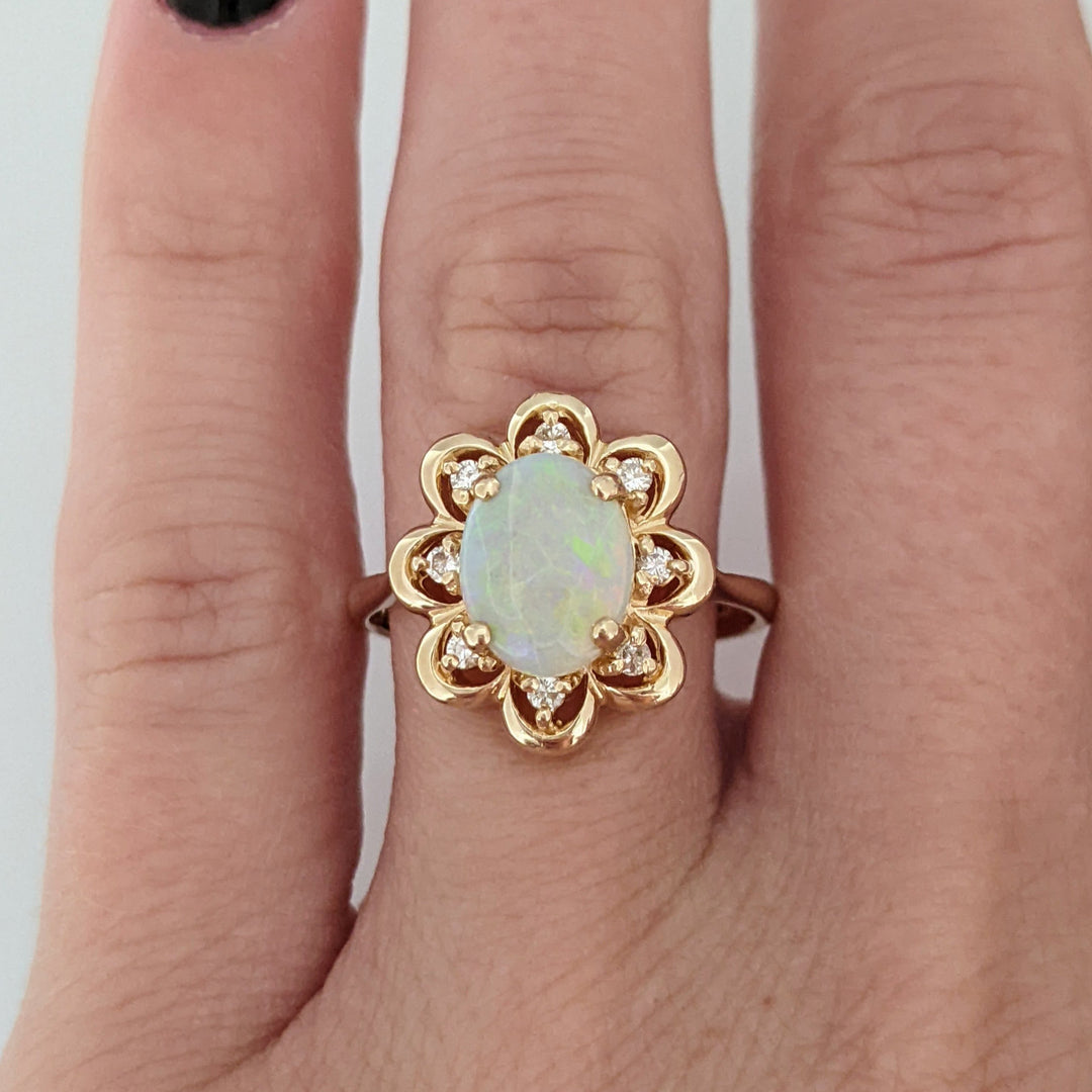 14K OPAL OVAL 7X9 WITH (8) MELEE ESTATE FLOWER RING 3.9 GRAMS