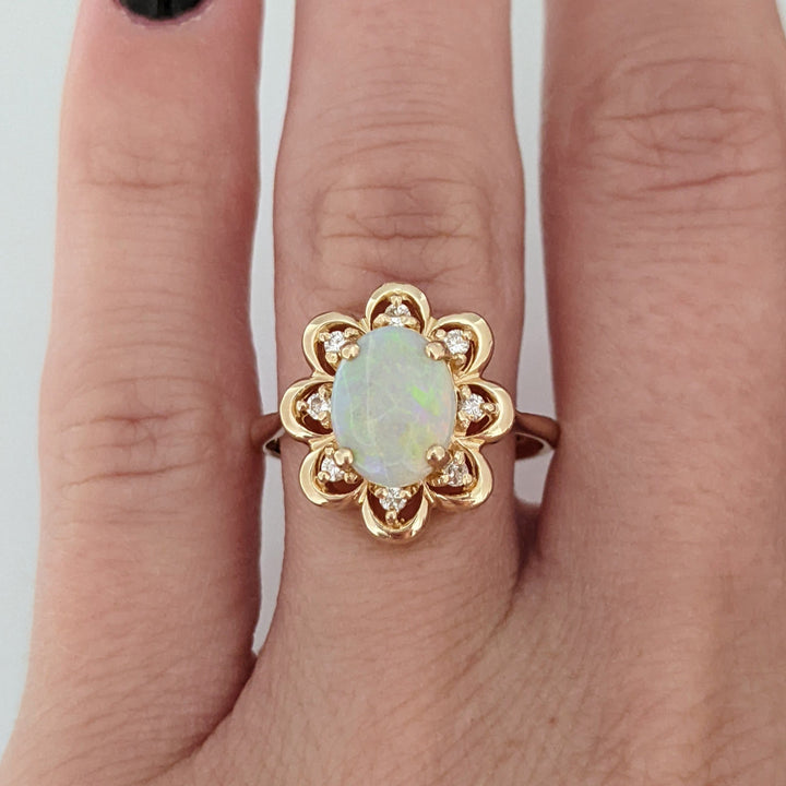 14K OPAL OVAL 7X9 WITH (8) MELEE ESTATE FLOWER RING 3.9 GRAMS