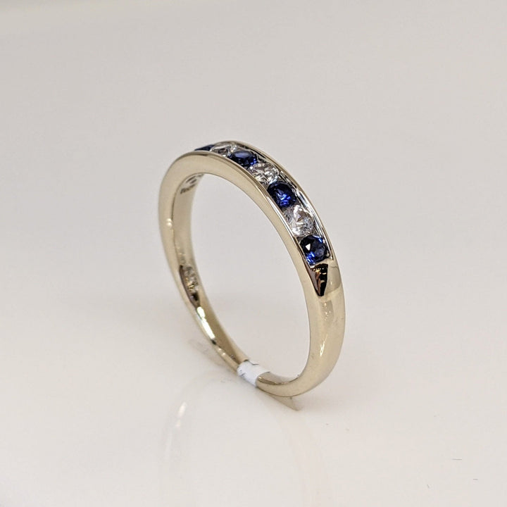 10K BLUE/ WHITE SAPPHIRE ROUND (9) ESTATE CHANNEL BAND 2.0 GRAMS