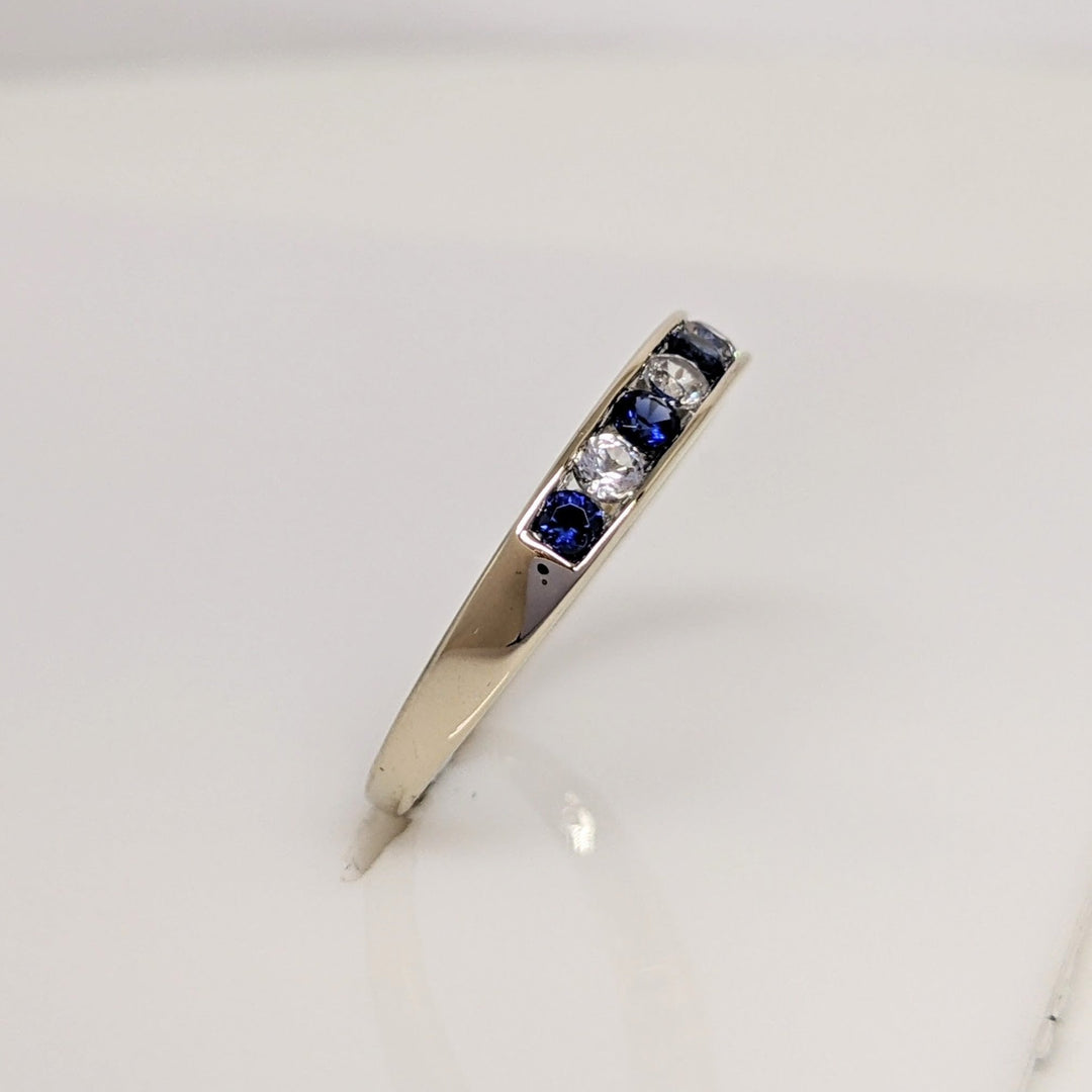 10K BLUE/ WHITE SAPPHIRE ROUND (9) ESTATE CHANNEL BAND 2.0 GRAMS