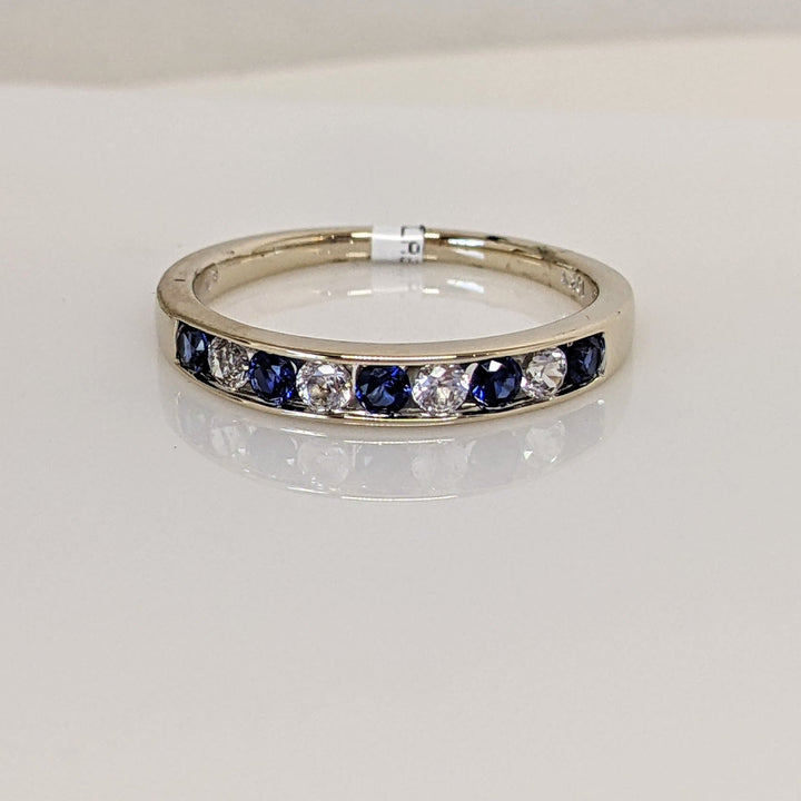 10K BLUE/ WHITE SAPPHIRE ROUND (9) ESTATE CHANNEL BAND 2.0 GRAMS