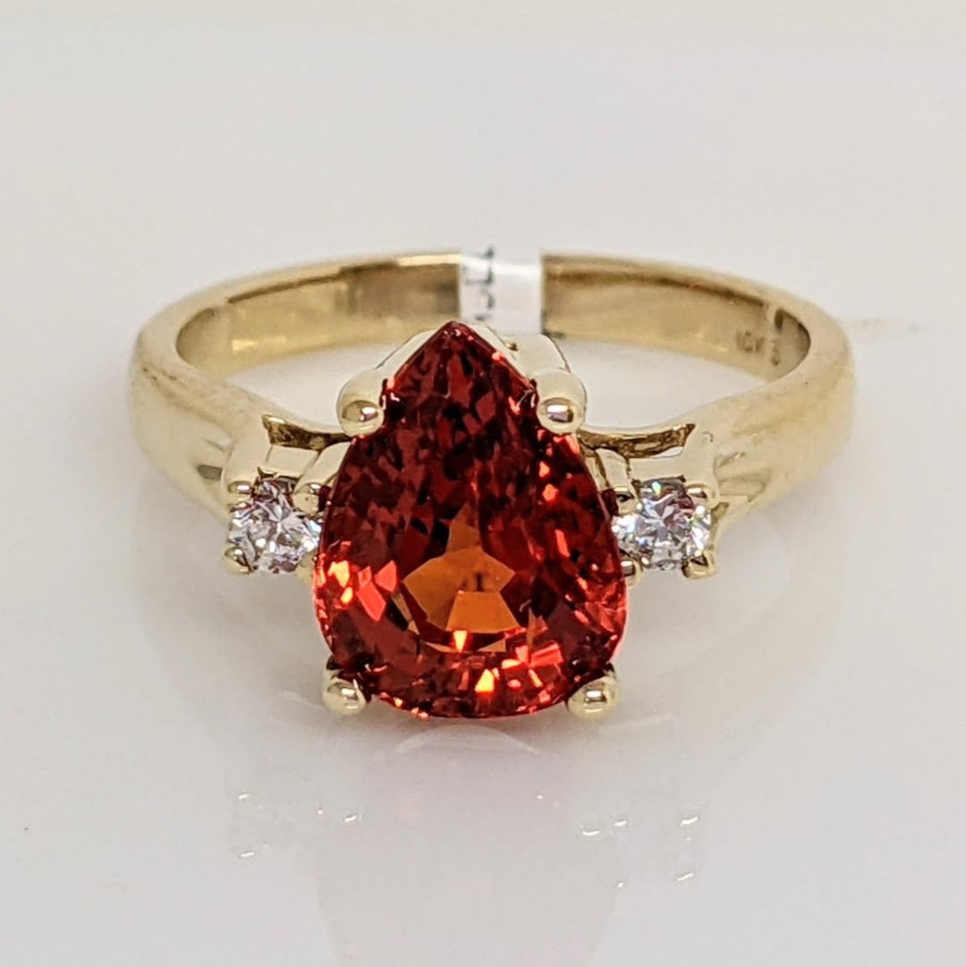 10K LAB CREATED ORANGE SAPPHIRE PEAR 8X10 WITH (2) CUBIC ZIRCONIA ESTATE RING 4.2 GRAMS