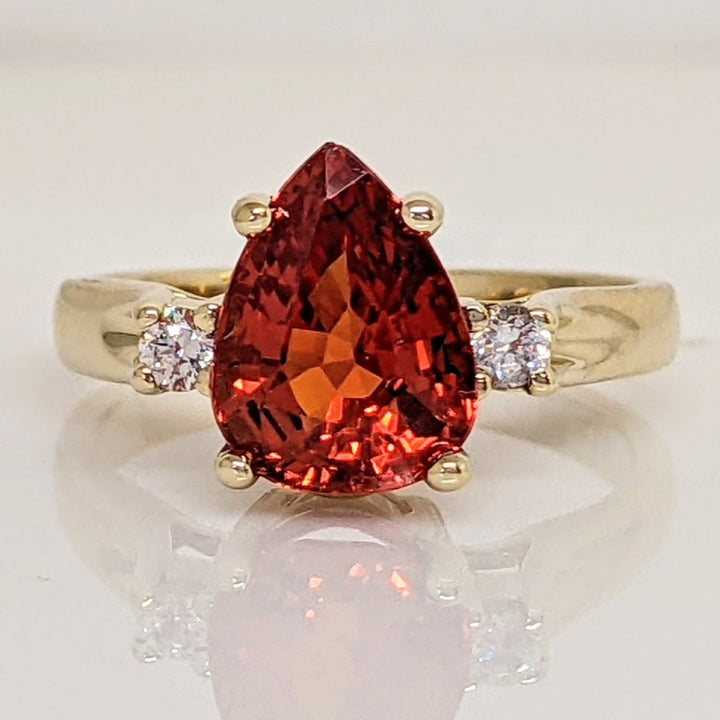 10K LAB CREATED ORANGE SAPPHIRE PEAR 8X10 WITH (2) CUBIC ZIRCONIA ESTATE RING 4.2 GRAMS