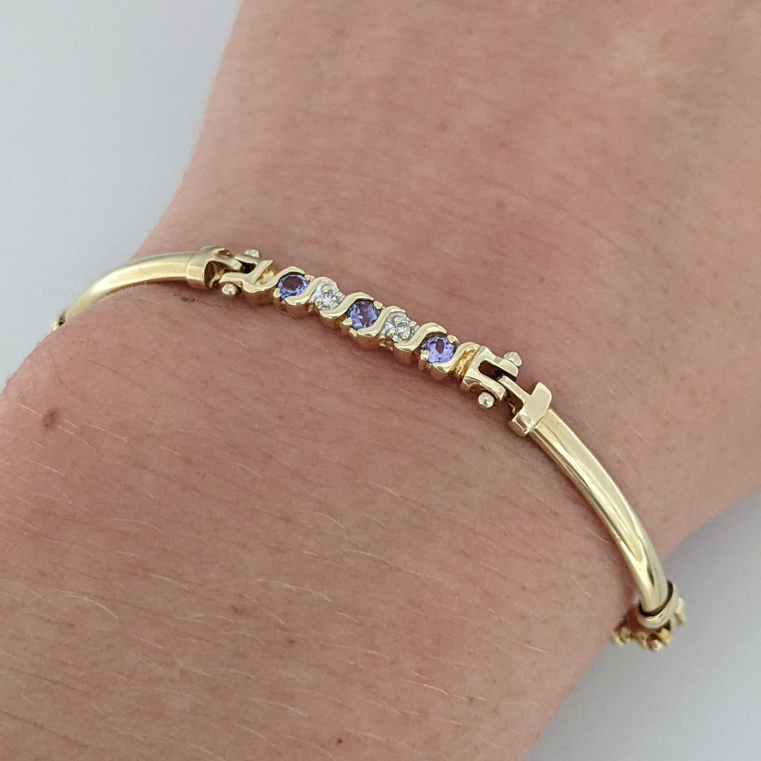 14K DIAMOND ROUND (6) .06CTW WITH (9) TANZANITE ROUND 2.5MM ESTATE BRACELET 8.1 GRAMS