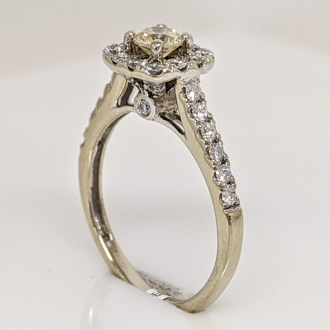 10K WHITE .73 CARAT TOTAL WEIGHT I1 CHAMPANGE DIAMOND WITH (24) ROUND I1 H HALO ESTATE RING 2.4 GRAMS