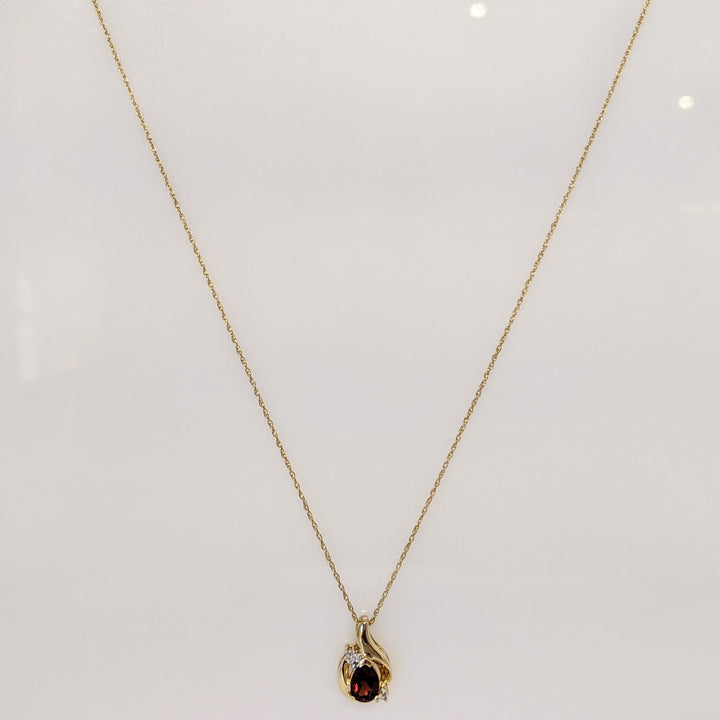 10K GARNET PEAR 5X7 WITH MELEE ESTATE PENDANT & CHAIN 2.0 GRAMS