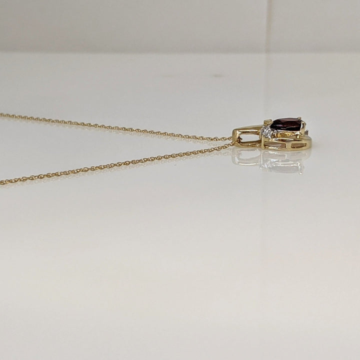 10K GARNET PEAR 5X7 WITH MELEE ESTATE PENDANT & CHAIN 2.0 GRAMS