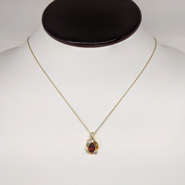 10K GARNET PEAR 5X7 WITH MELEE ESTATE PENDANT & CHAIN 2.0 GRAMS