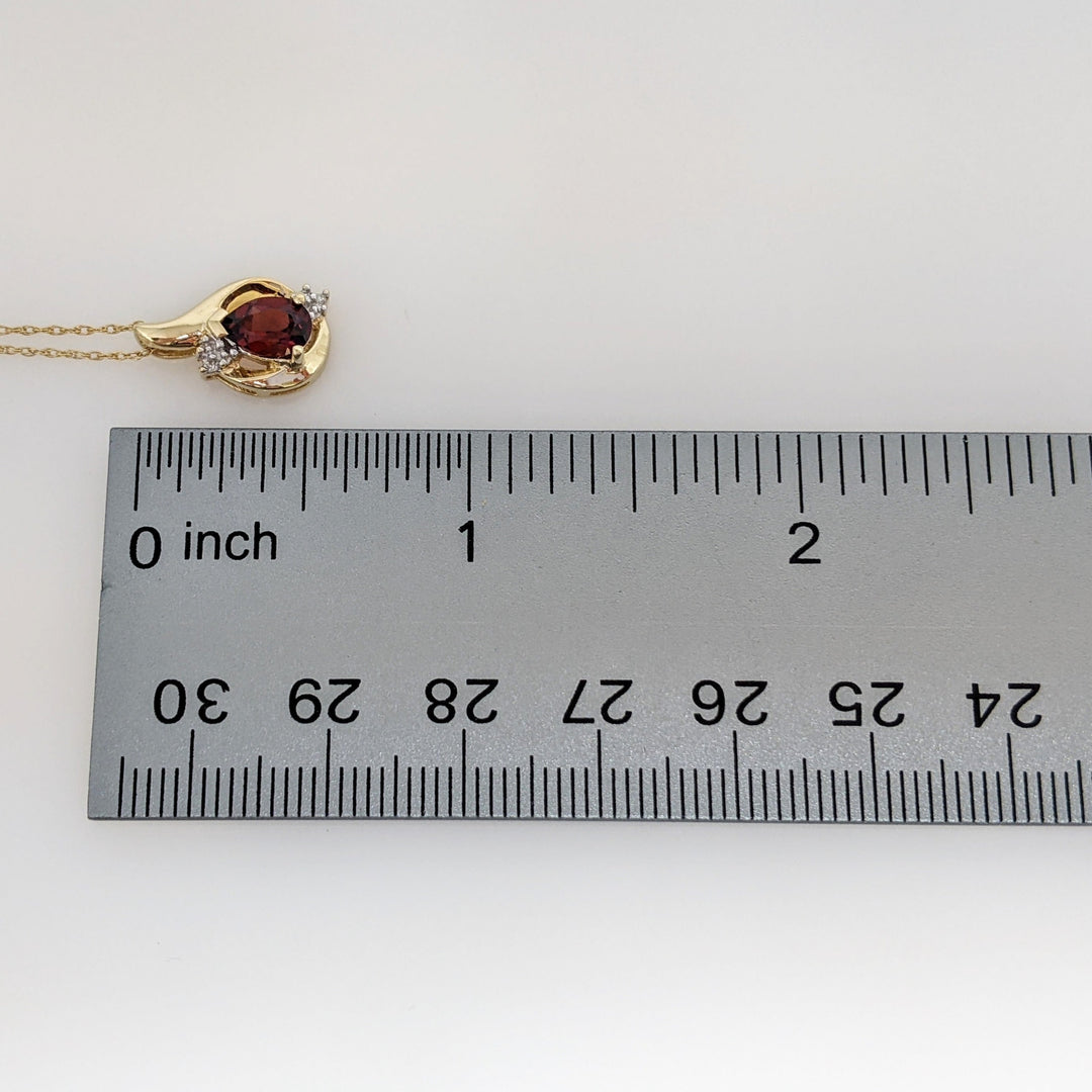 10K GARNET PEAR 5X7 WITH MELEE ESTATE PENDANT & CHAIN 2.0 GRAMS