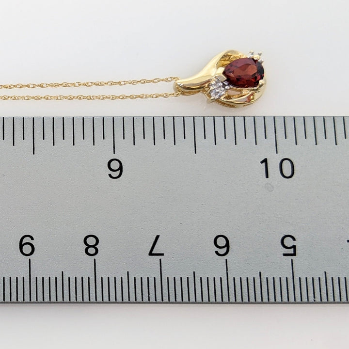 10K GARNET PEAR 5X7 WITH MELEE ESTATE PENDANT & CHAIN 2.0 GRAMS