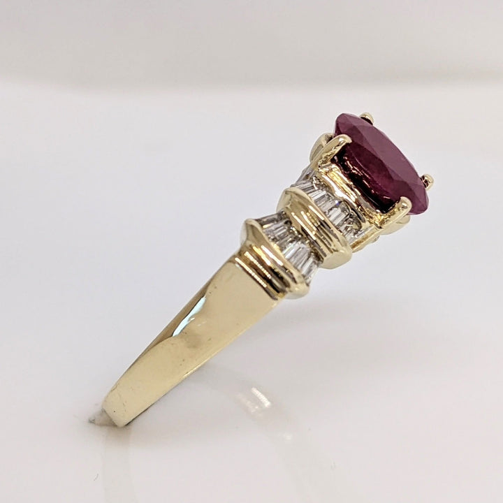 14K RUBY OVAL 6X8 "C" WITH .48DTW BAGUETTE (16) ESTATE RING 4.2 GRAMS