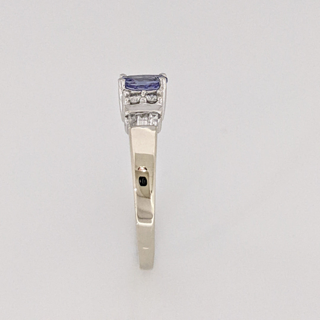 14K WHITE TANZANITE OVAL 4X6 WITH (4) ROUND MELEE AND (6) BAGUETTE ESTATE RING 2.8 GRAMS