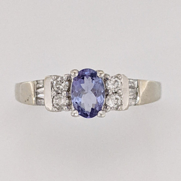 14K WHITE TANZANITE OVAL 4X6 WITH (4) ROUND MELEE AND (6) BAGUETTE ESTATE RING 2.8 GRAMS