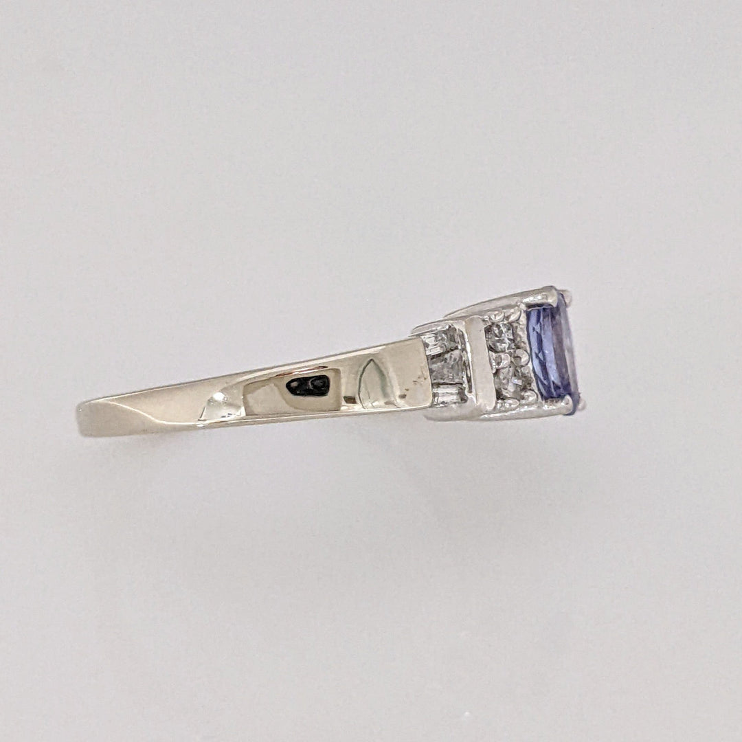 14K WHITE TANZANITE OVAL 4X6 WITH (4) ROUND MELEE AND (6) BAGUETTE ESTATE RING 2.8 GRAMS