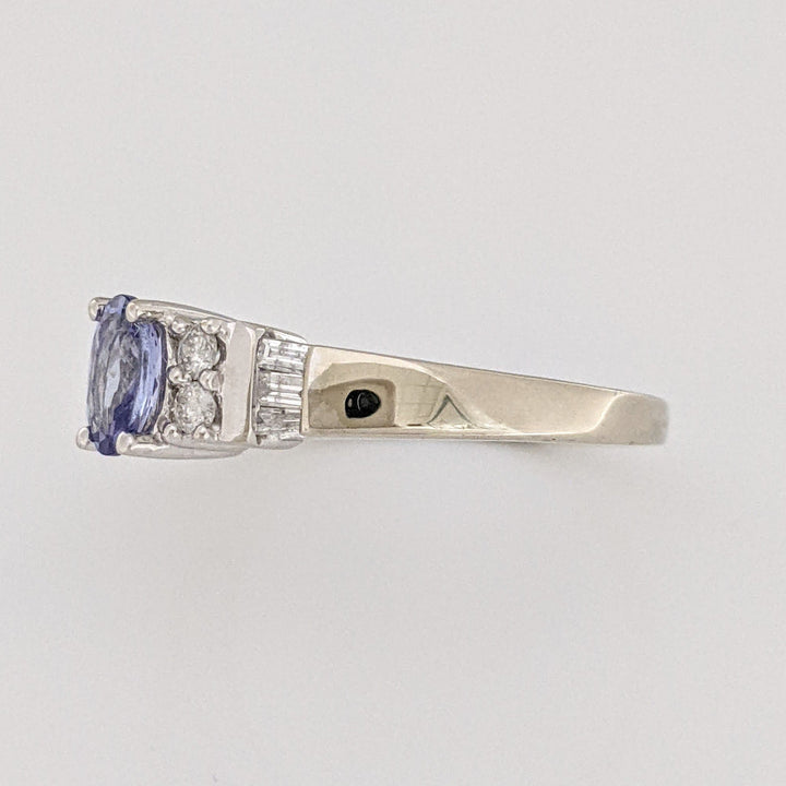 14K WHITE TANZANITE OVAL 4X6 WITH (4) ROUND MELEE AND (6) BAGUETTE ESTATE RING 2.8 GRAMS