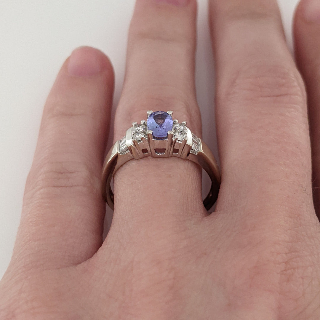 14K WHITE TANZANITE OVAL 4X6 WITH (4) ROUND MELEE AND (6) BAGUETTE ESTATE RING 2.8 GRAMS