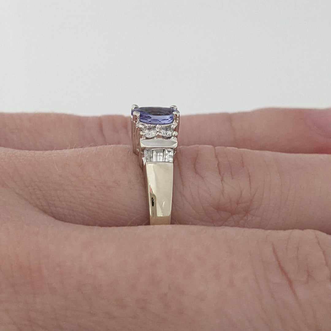 14K WHITE TANZANITE OVAL 4X6 WITH (4) ROUND MELEE AND (6) BAGUETTE ESTATE RING 2.8 GRAMS