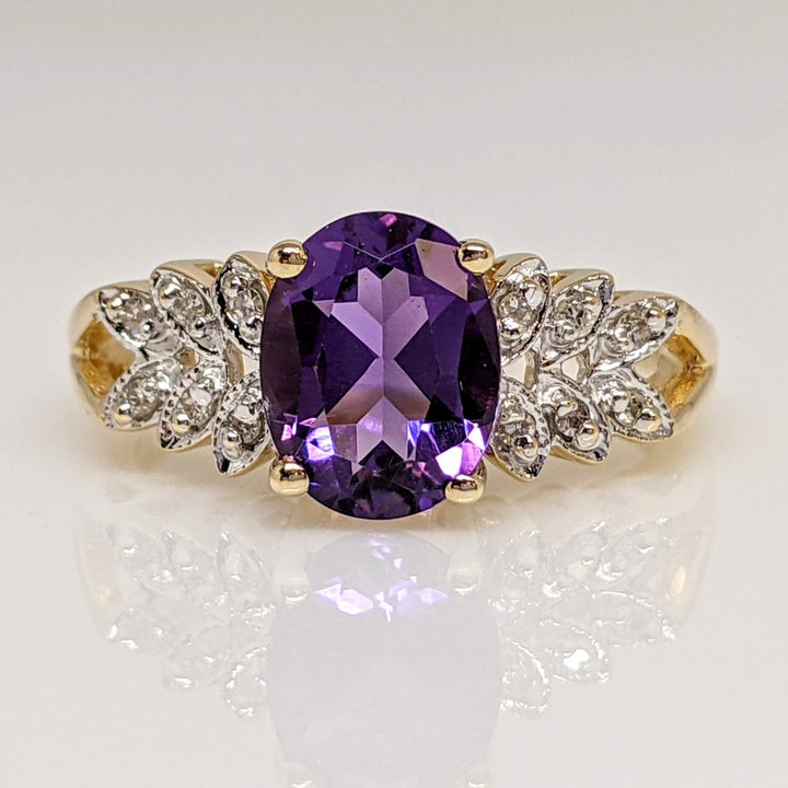 14K AMETHYST OVAL 7X9WITH (6) MELEE ESTATE RING 4.2 GRAMS