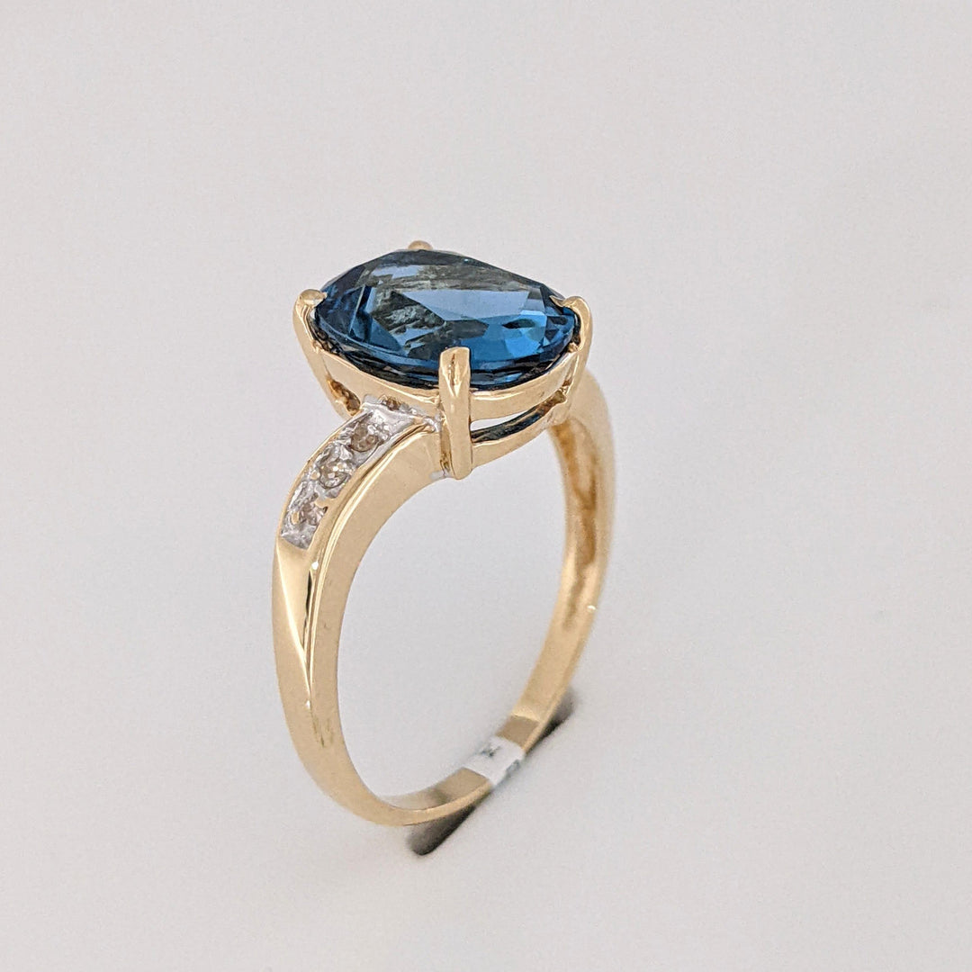 14K LONDON BLUE TOPAZ OVAL 9X11 WITH (6) DIAMONDS ESTATE RING 3.4 GRAMS