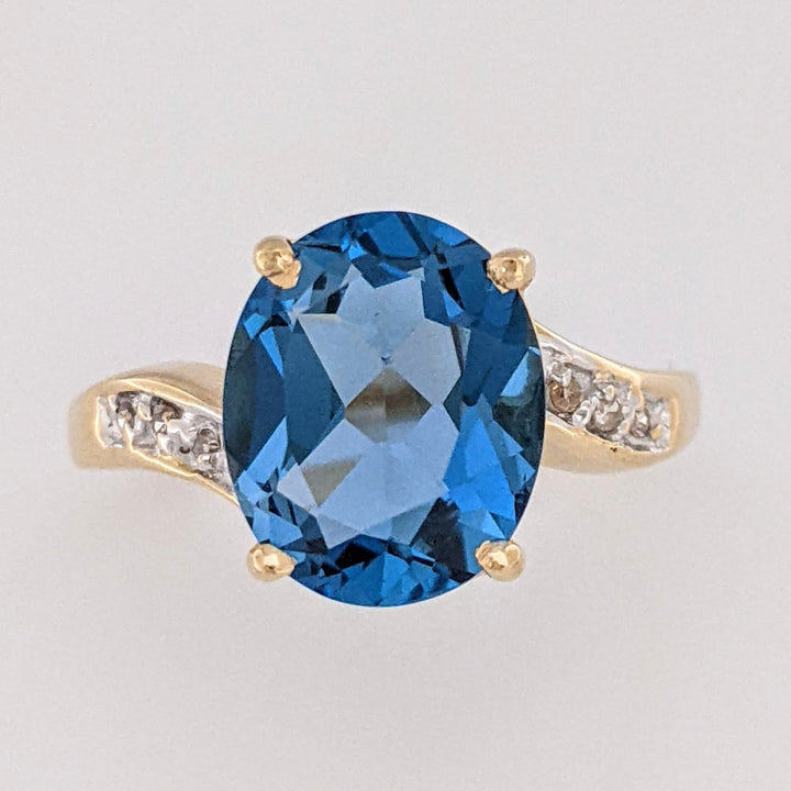 14K LONDON BLUE TOPAZ OVAL 9X11 WITH (6) DIAMONDS ESTATE RING 3.4 GRAMS