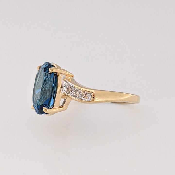 14K LONDON BLUE TOPAZ OVAL 9X11 WITH (6) DIAMONDS ESTATE RING 3.4 GRAMS