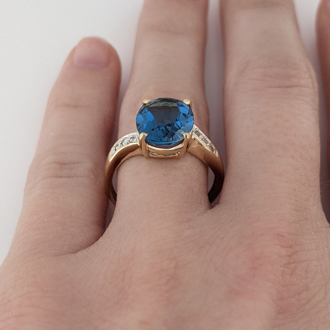 14K LONDON BLUE TOPAZ OVAL 9X11 WITH (6) DIAMONDS ESTATE RING 3.4 GRAMS