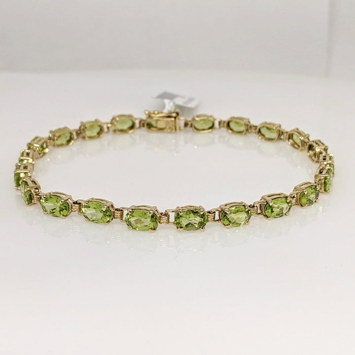 10K PERIDOT OVAL (22) 4X6 ESTATE BRACELET 6.9 GRAMS