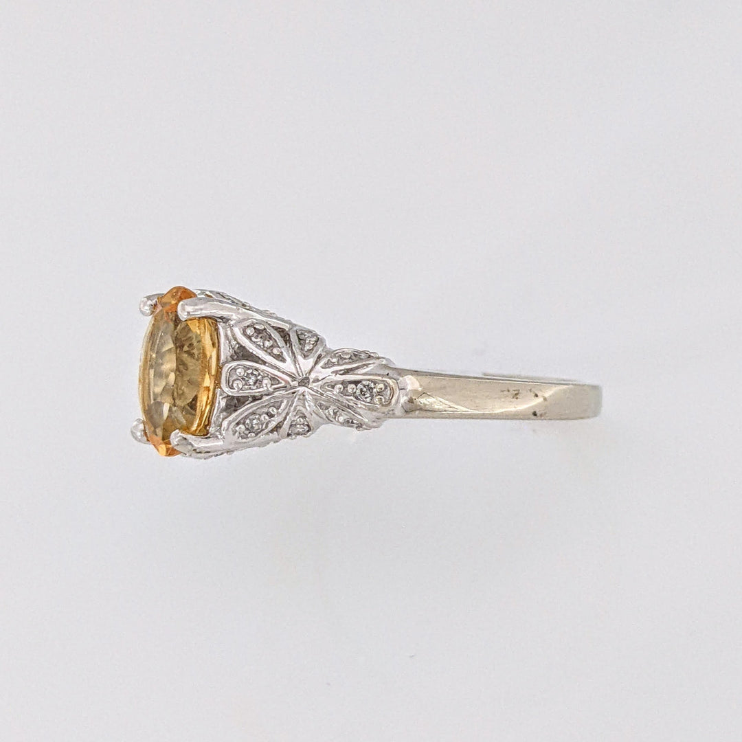 10K WHITE CITRINE OVAL 7X9 WITH MELEE ESTATE RING 3.8 GRAMS