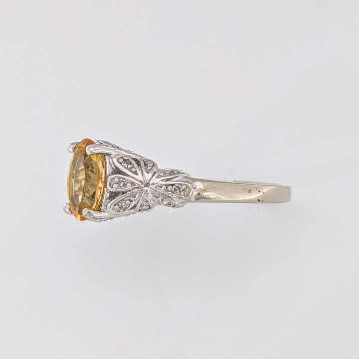 10K WHITE CITRINE OVAL 7X9 WITH MELEE ESTATE RING 3.8 GRAMS