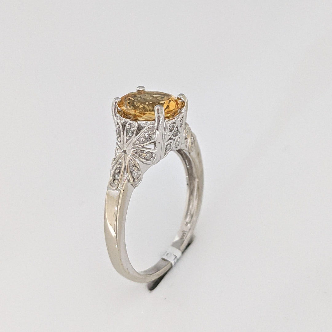 10K WHITE CITRINE OVAL 7X9 WITH MELEE ESTATE RING 3.8 GRAMS