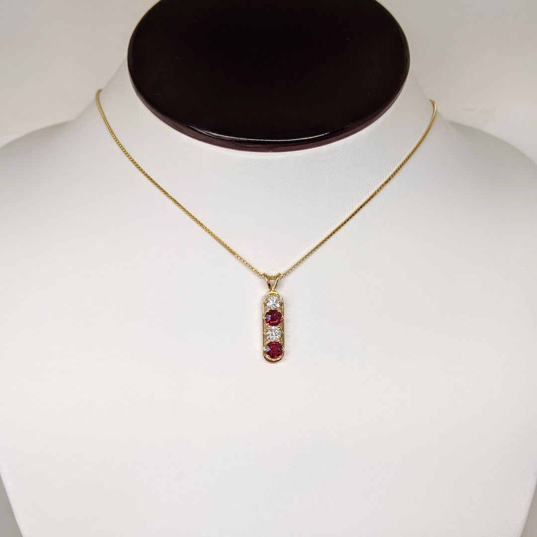 14K RUBY ROUND 4.5MM (2) DIAMOND ROUND (2) .46DTW ESTATE PENDANT & CHAIN 4.3 GRAMS