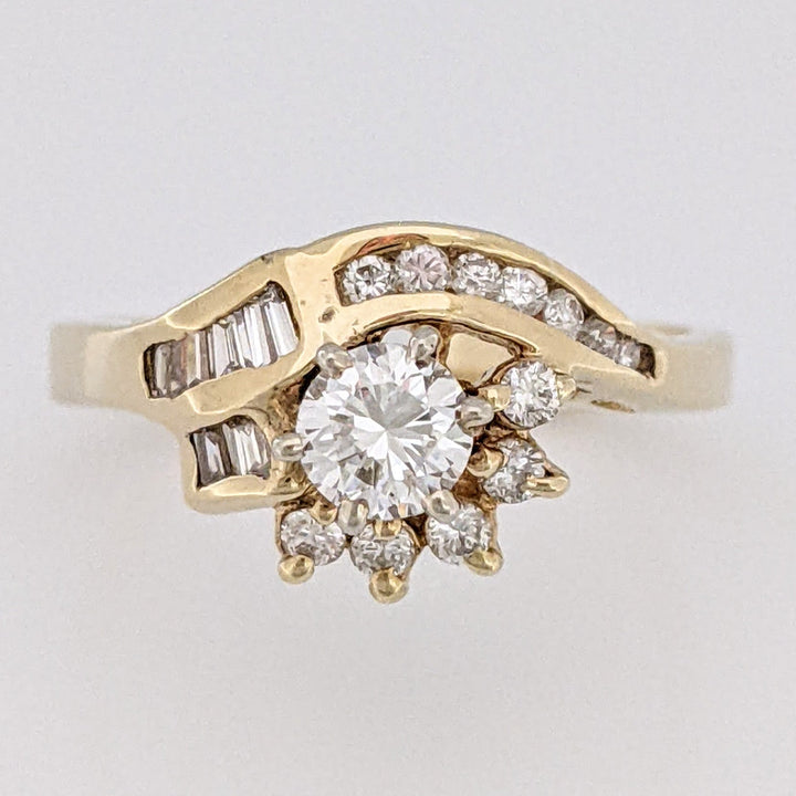 14K .71 CARAT TOTAL WEIGHT SI2-I1 H DIAMOND ROUND WITH BAGUETTE(6) AND MELEE(12) ESTATE RING 3.6 GRAMS