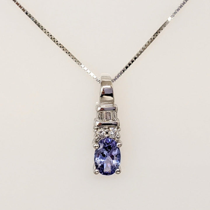 14K WHITE TANZANITE OVAL 4X6 WITH (2) ROUND AND (3) BAGUETTE DIAMONDS ESTATE PENDANT & CHAIN 1.9 GRAMS