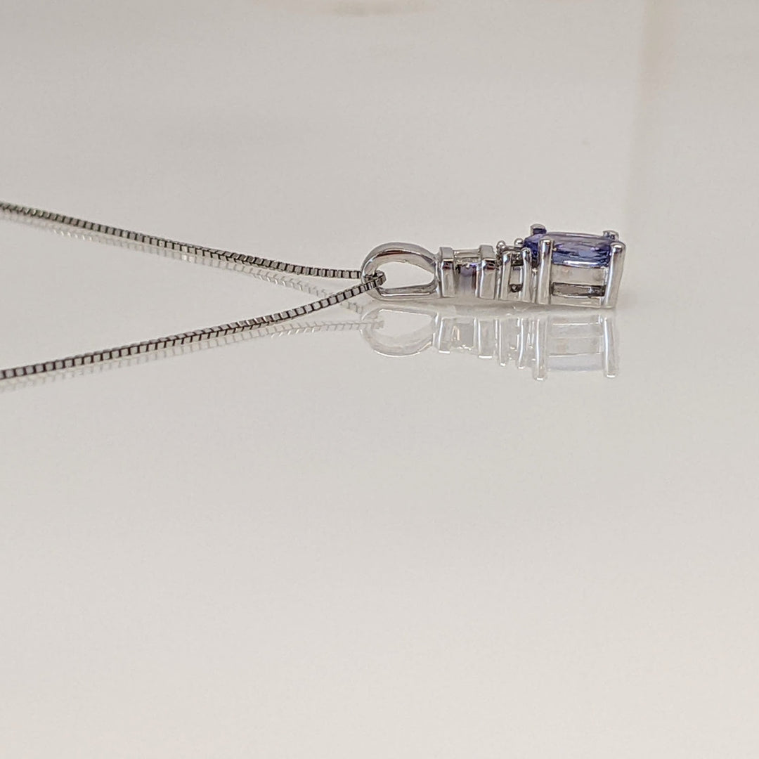 14K WHITE TANZANITE OVAL 4X6 WITH (2) ROUND AND (3) BAGUETTE DIAMONDS ESTATE PENDANT & CHAIN 1.9 GRAMS