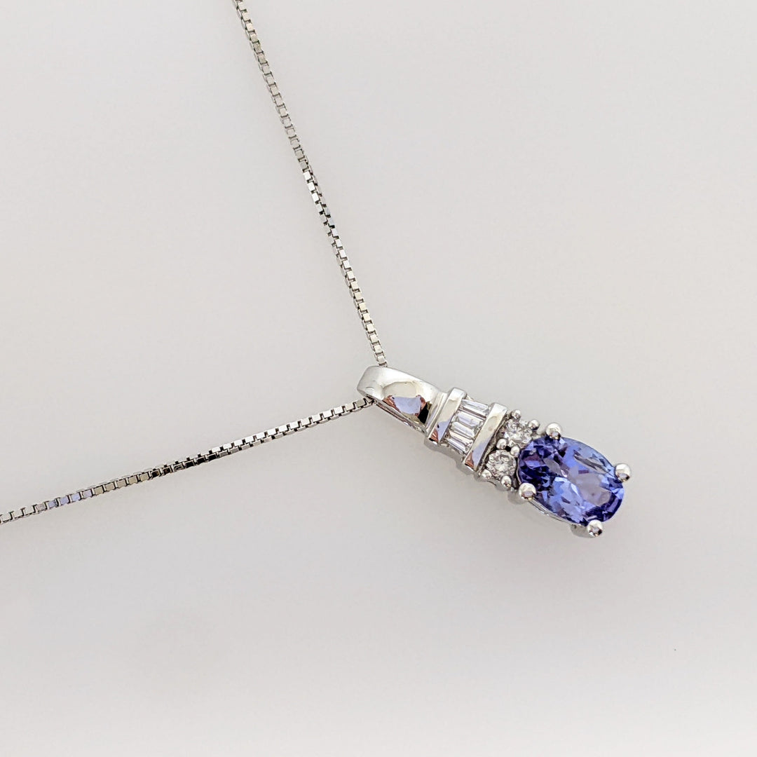 14K WHITE TANZANITE OVAL 4X6 WITH (2) ROUND AND (3) BAGUETTE DIAMONDS ESTATE PENDANT & CHAIN 1.9 GRAMS