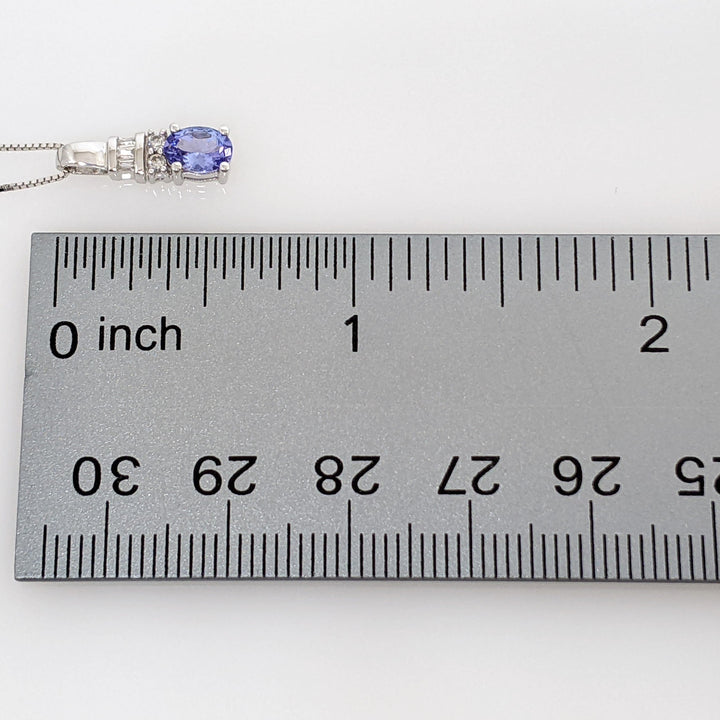 14K WHITE TANZANITE OVAL 4X6 WITH (2) ROUND AND (3) BAGUETTE DIAMONDS ESTATE PENDANT & CHAIN 1.9 GRAMS