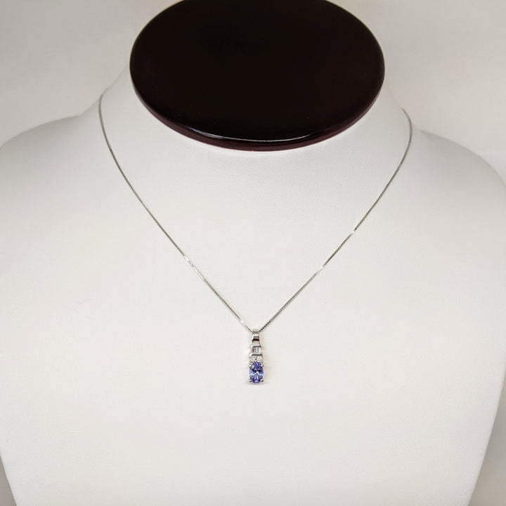 14K WHITE TANZANITE OVAL 4X6 WITH (2) ROUND AND (3) BAGUETTE DIAMONDS ESTATE PENDANT & CHAIN 1.9 GRAMS