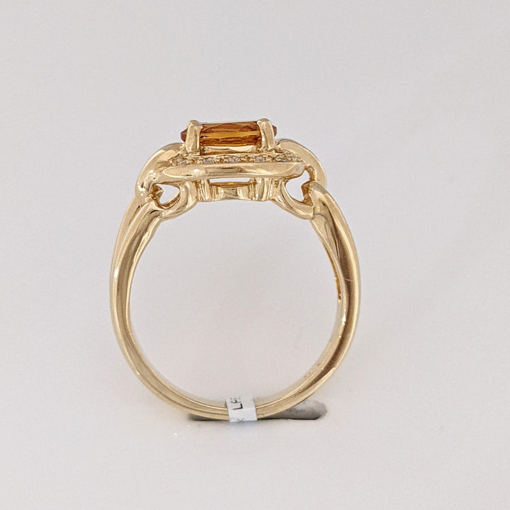 14K CITRINE OVAL 6X8 WITH (12) MELEE ESTATE RING 5.0 GRAMS