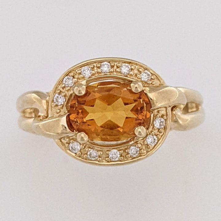 14K CITRINE OVAL 6X8 WITH (12) MELEE ESTATE RING 5.0 GRAMS