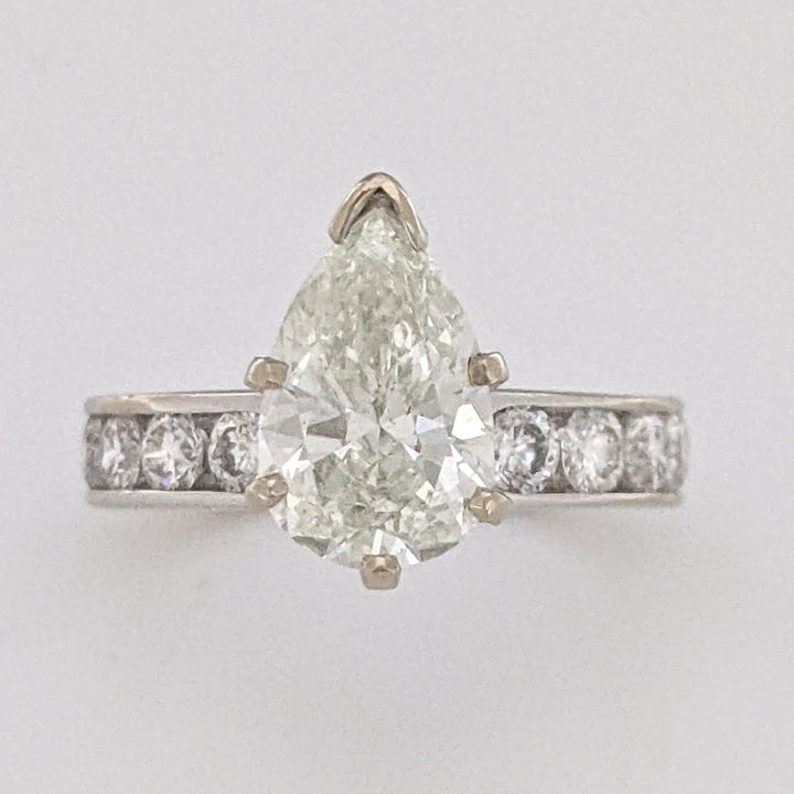 14K WHITE 2.39 CARAT TOTAL WEIGHT I1 K DIAMOND PEAR WITH (10) ROUND CHANNEL DIAMOND ESTATE RING 4.1 GRAMS